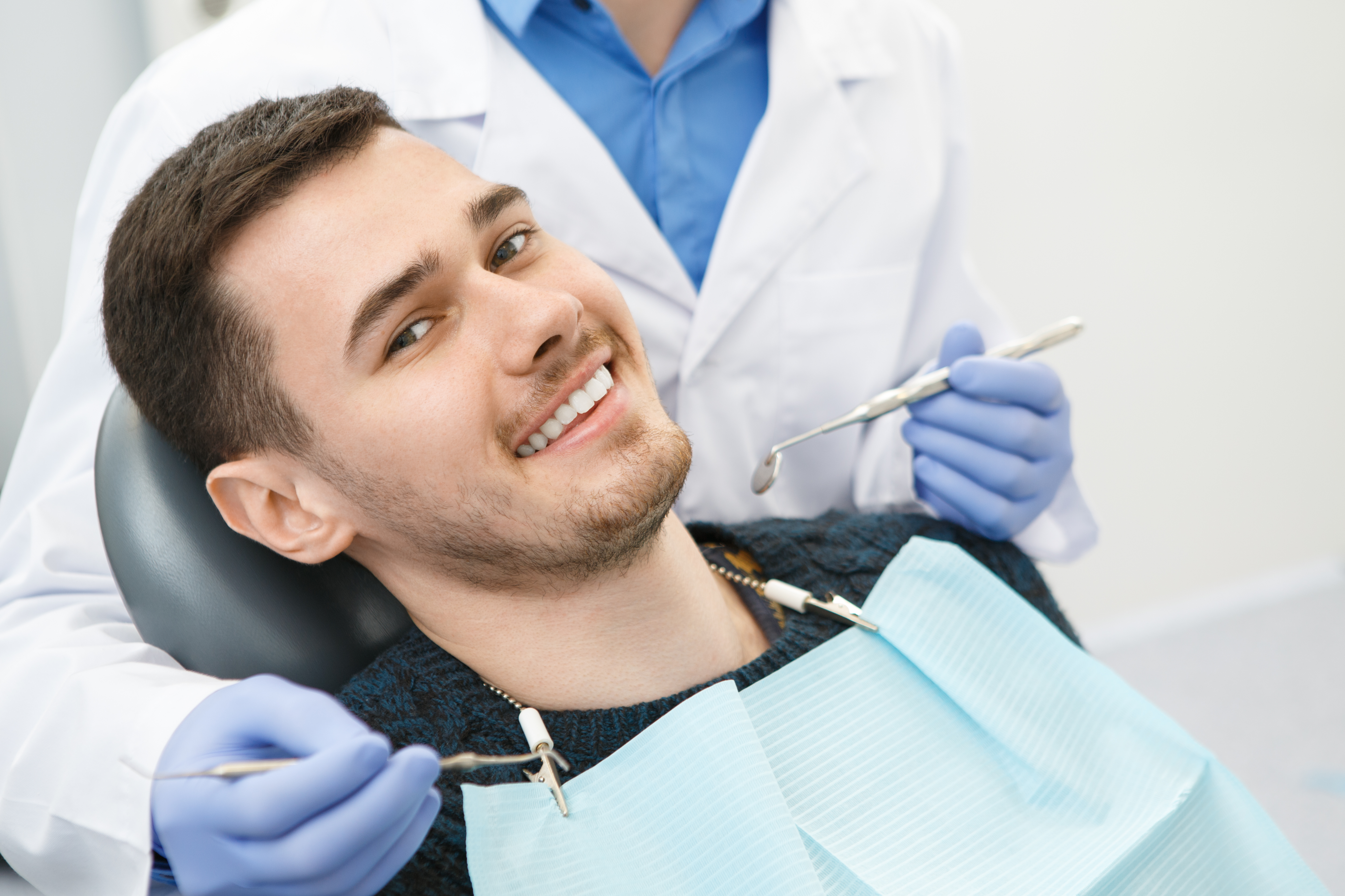 Dental patient in chair with dentist